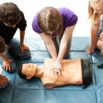 Teenagers Practice CPR